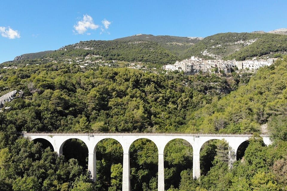 Old Cassan railway viaduct, with the village of Tourrettes-sur-Loup in the background